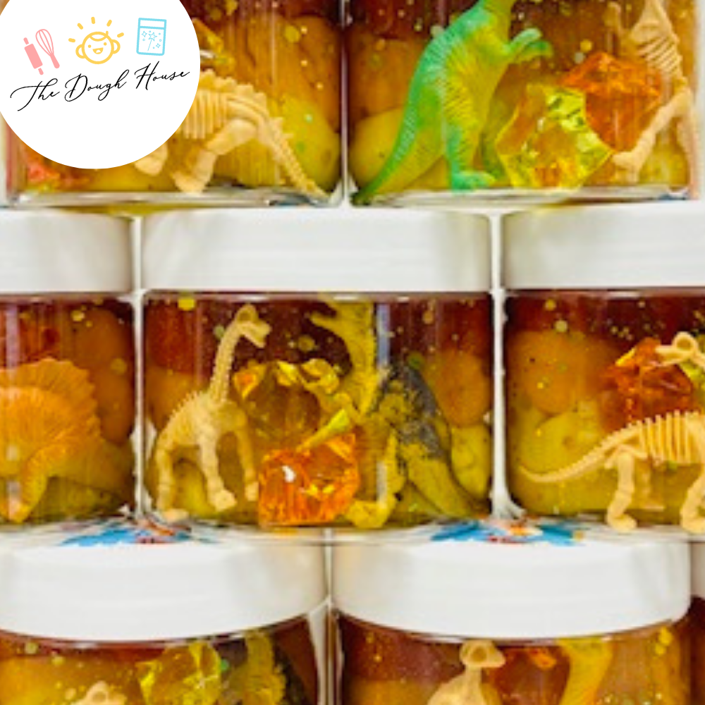 Handmade dinosaur sensory play jar for toddlers